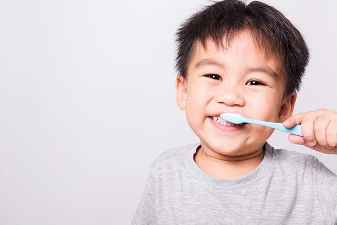 cultuvating-healthy-oral-habits-cute-kid-toothbrush-smile-dental-care-oral-health