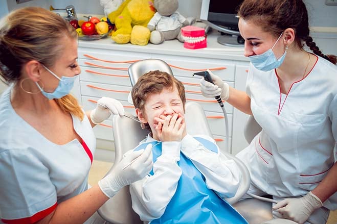 dental-fear-kid-dentist-female-scare-cry-worry-dental-care-oral-health