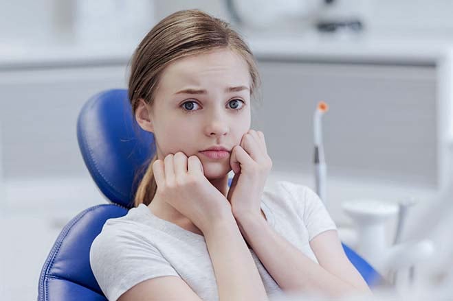 dental-phobia-fear-scare-pretty-girl-dental-care-oral-health