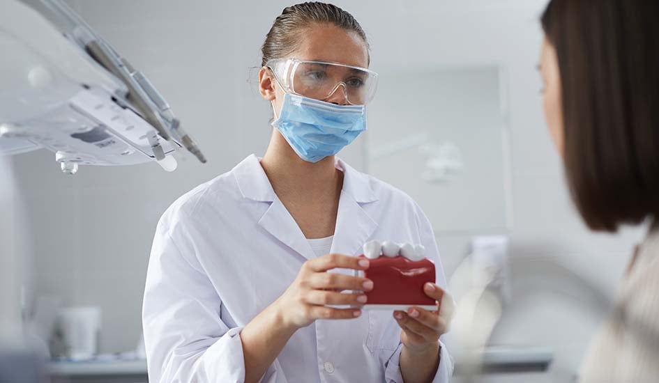 dental-surgeon-consulting-patient-dentist-check-up-oral-health-dental-care