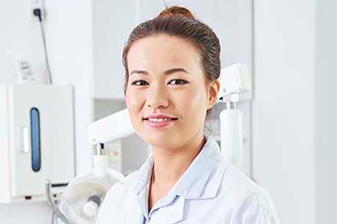 invasive-dental-procedures-female-dentist-smile-dental-care-oral-health
