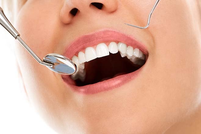 maintenance-of-oral-health-checking-with-dental-care-smile-happy