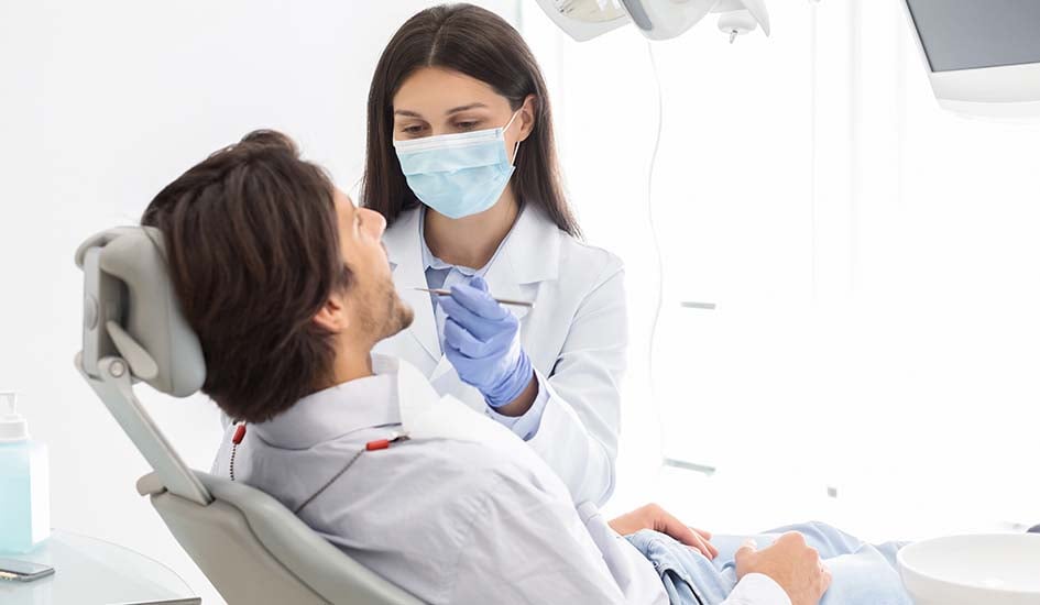 man-having-check-up-in-new-dental-office