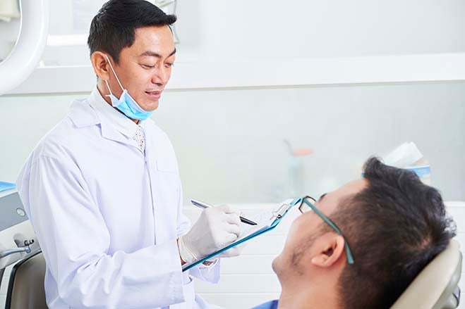 single-visit-male-dentist-face-to-face-dental-care-oral-health