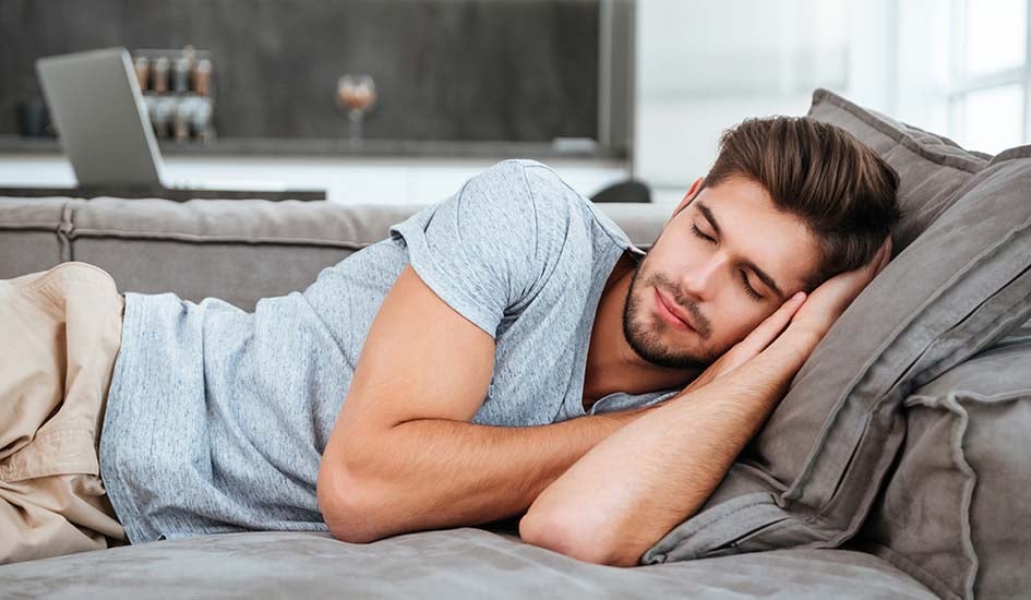 sleep-dentistry-handsome-man-sleeping-on-sofa-breath-health