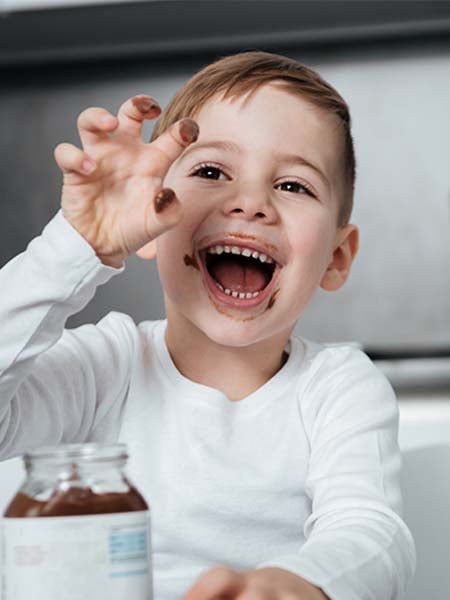 tongue-tie release-kid-dental-care-oral-health-eating-kid-happy-playful