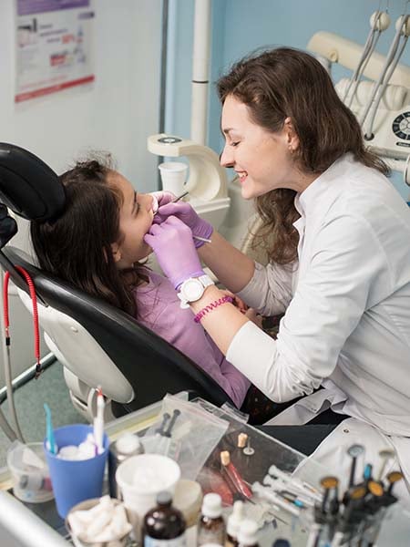 extraction-dental-check-up-oral-health-female-dentist