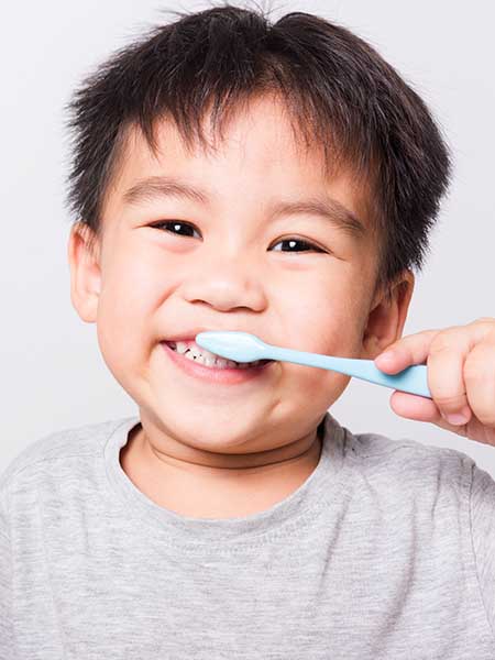 helping-your-child-cope-with-their-first-dental-visit-kids-oral-health-dental-care-happy-toothbrush