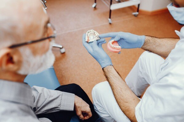 old-man-sitting-dentist-s-office_1157-19451 (1)