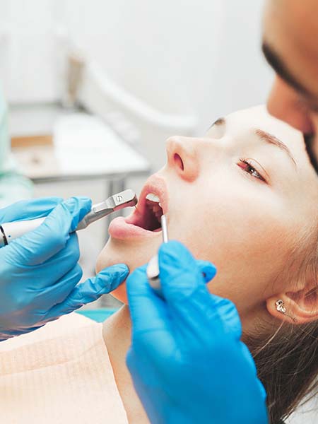 what-is-an-airflow-treatment-girl-dental-care-treatment-oral-health