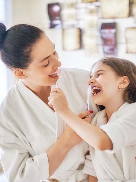 what-is-bite-balancing-family-mother-girl-child-dental-care-oral-health